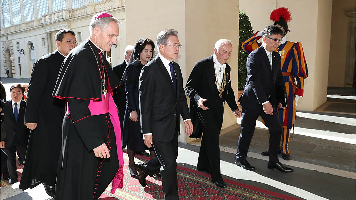 Attending a welcoming ceremony at the Apostolic Palace of the Vatican