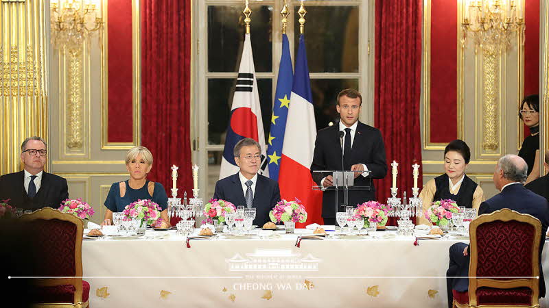 Attending a state dinner hosted by President Emmanuel Macron