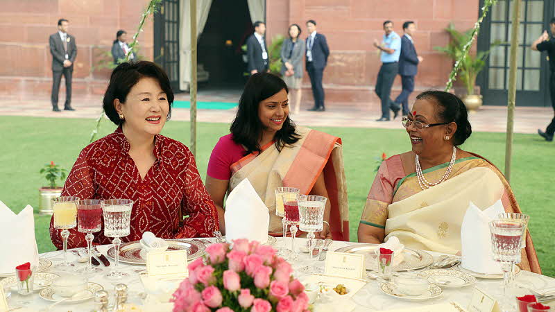 First Lady Kim Jung-sook attending a luncheon hosted by First Lady Savita Kovind of India