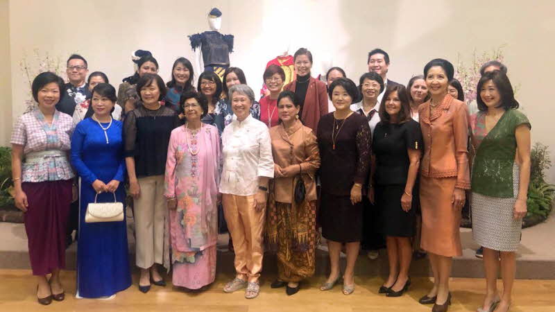 First Lady Kim Jung-sook posing for a commemorative photo during an event for spouses of leaders attending ASEAN-related summits