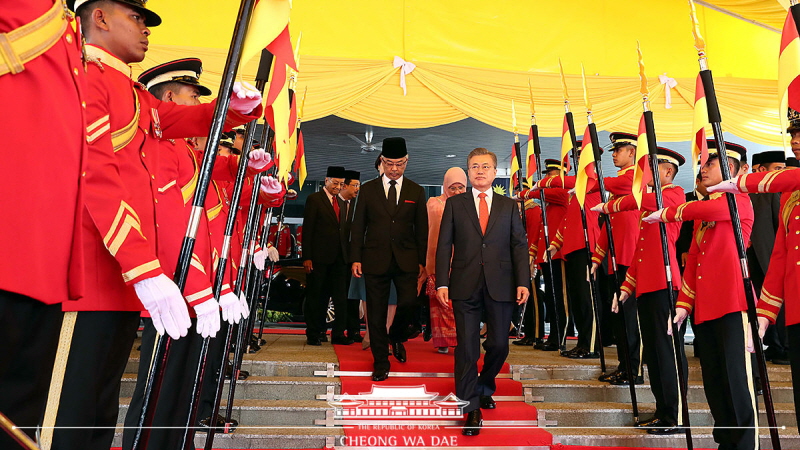 Attending the official welcoming ceremony in Malaysia