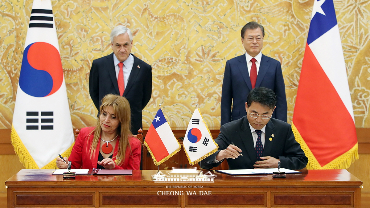 Attending a Korea-Chile agreement and MOU signing ceremony at Cheong Wa Dae