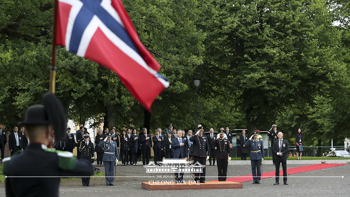 Laying a wreath at the national monument for World War II victims at Akershus Fortress in Oslo, Norway