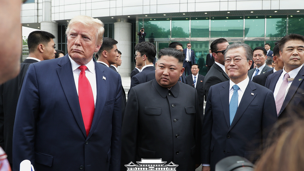 Leaders of the two Koreas and the United States meeting together for the first time in Panmunjeom