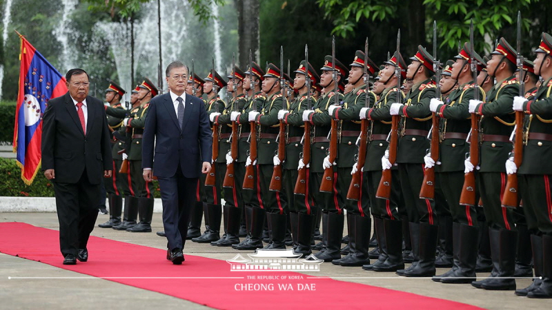 Attending the official welcoming ceremony at the Presidential Palace in Vientiane, Laos