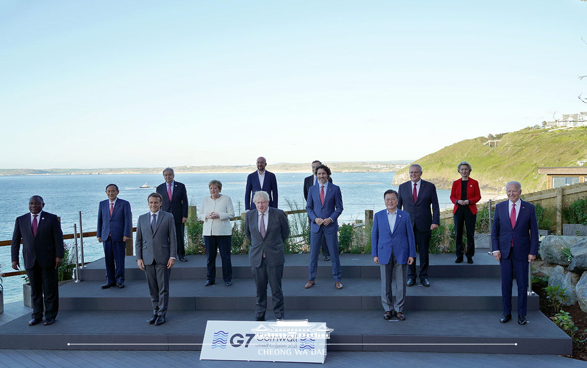 Posing for a group photo session of the G7 Summit in Cornwall, U.K.