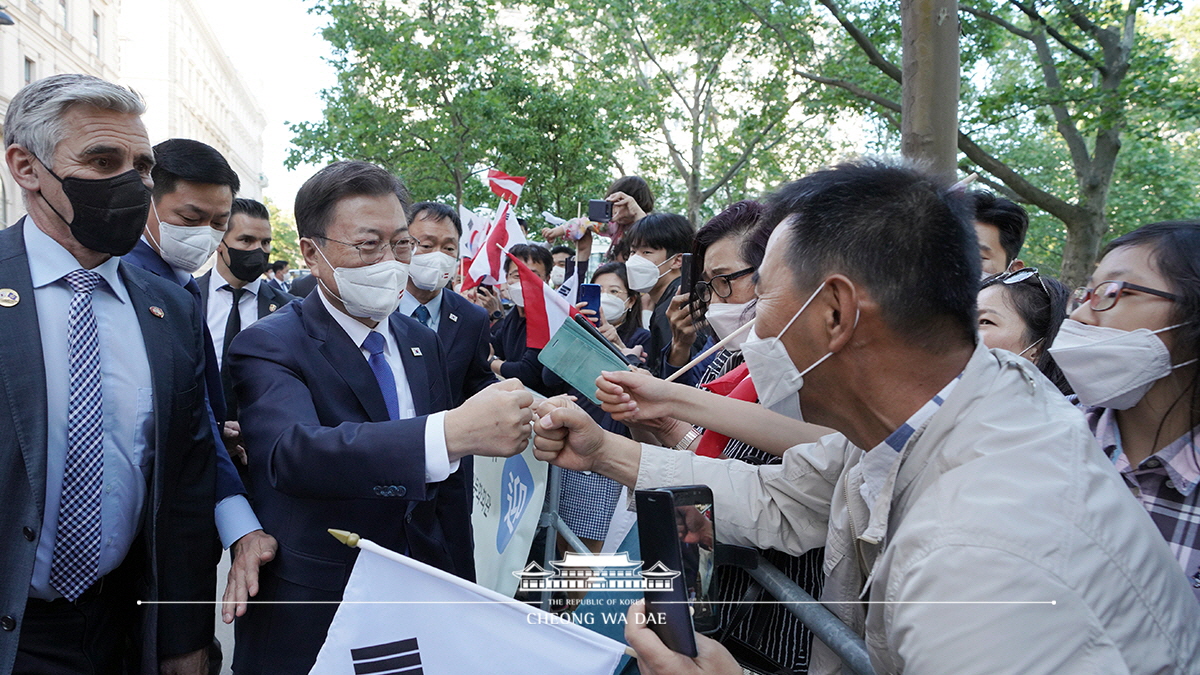 Being greeted by members of the local Korean community in Austria