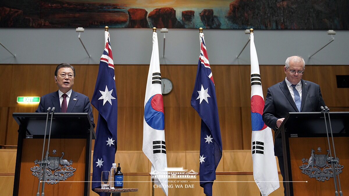 Attending a joint press conference following the Korea-Australia Summit