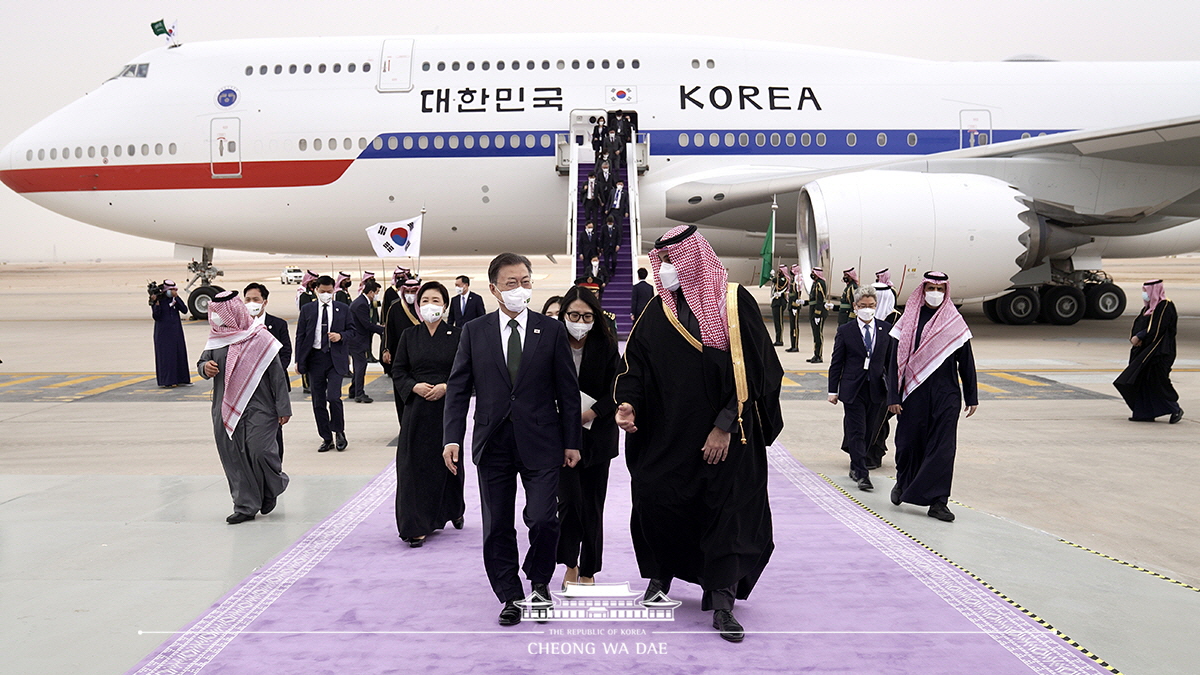 Arriving at King Khalid International Airport in Riyadh, Saudi Arabia, and attending the official welcoming ceremony