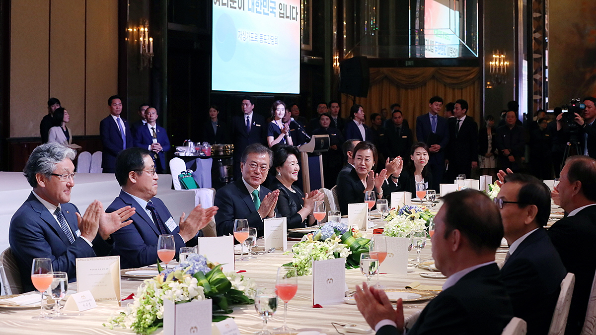 Attending a luncheon with members of the local Korean community in Singapore