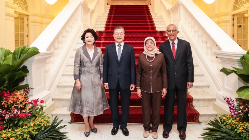 Posing for a commemorative photo at the Istana, the official residence and office of the President of Singapore