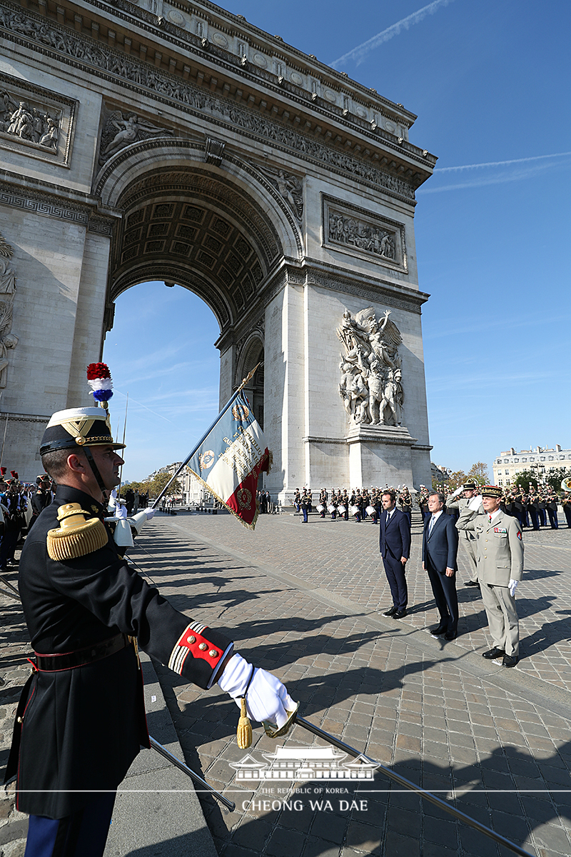 Attending the official welcoming ceremony at the Arc de Triomphe and laying a wreath at the Tomb of the Unknown Soldier 