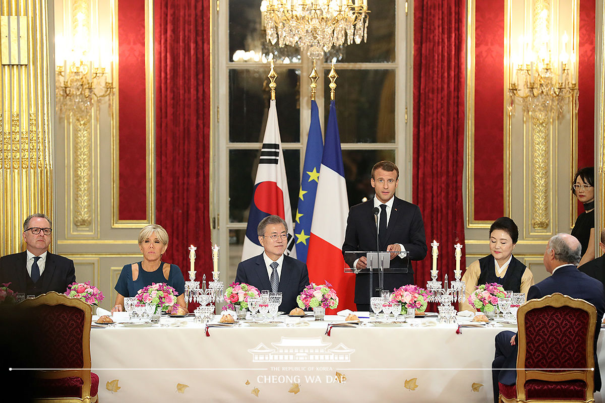 Attending a state dinner hosted by President Emmanuel Macron 