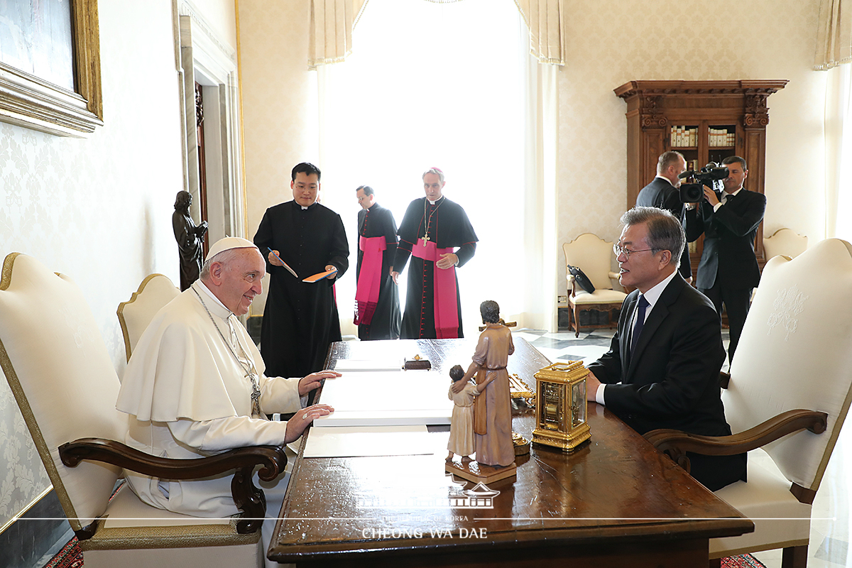 Having a private audience with Pope Francis at the Vatican 