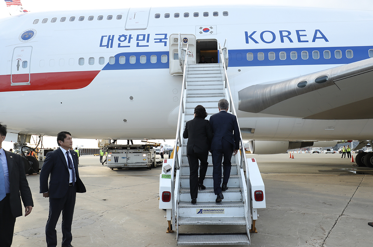 Attending the departure ceremony at John F. Kennedy International Airport in New York 