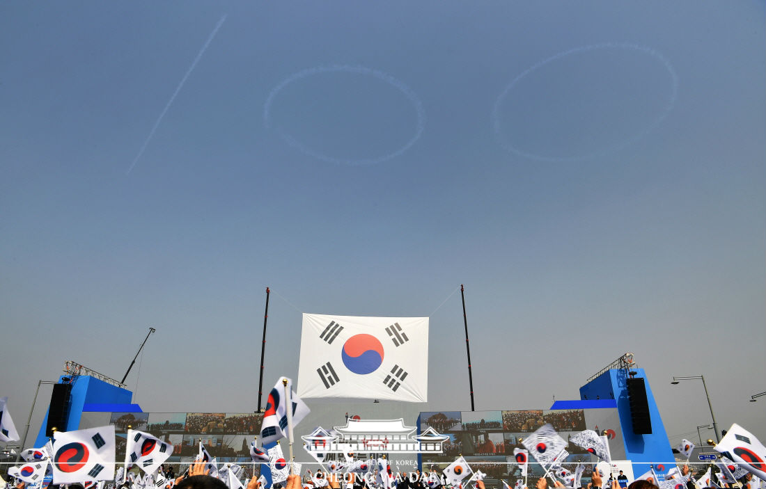 The number 100 on March 1 is written across the sky by the Korean Air Force team Black Eagles during the centennial anniversary ceremony for the March First Independence Movement in Seoul's Gwanghwamun Square.