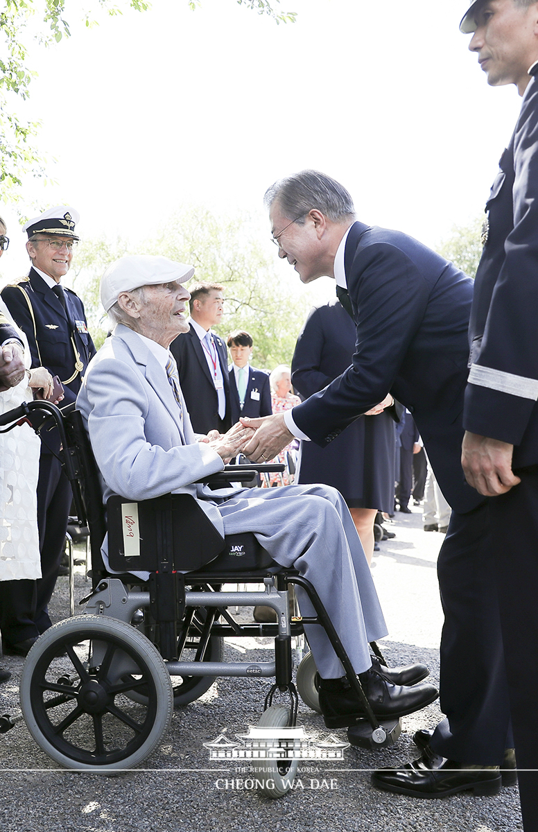 Attending the unveiling of a Korean War memorial at the Royal Djurgarden in Stockholm, Sweden 