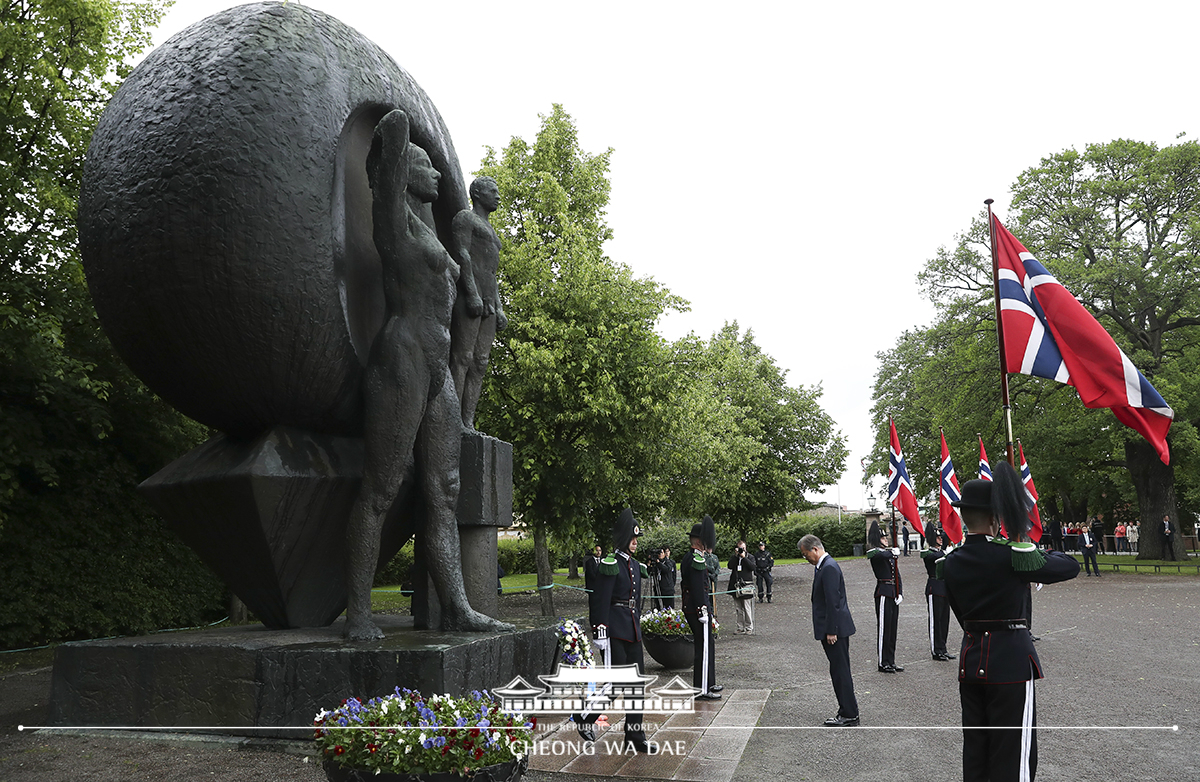 Laying a wreath at the national monument for World War II victims at Akershus Fortress in Oslo, Norway