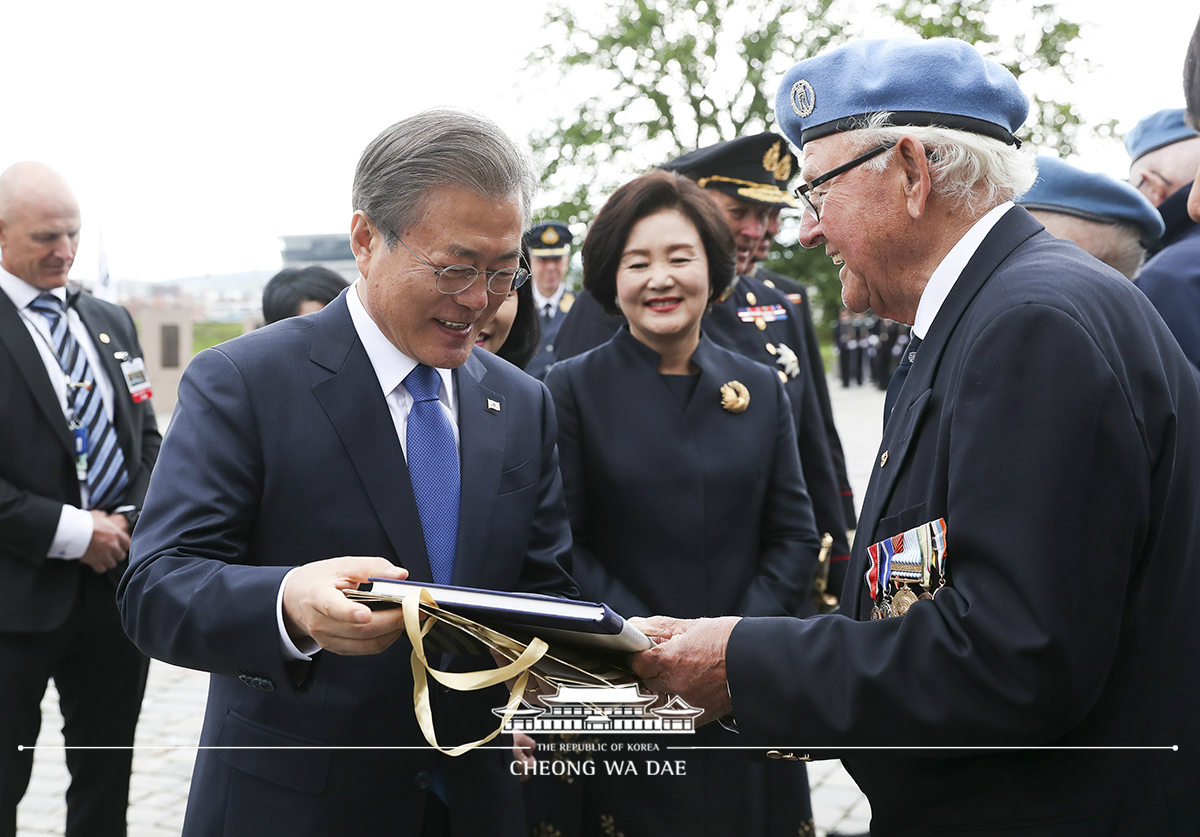 Laying a wreath at the Korean War veterans memorial at Akershus Fortress in Oslo, Norway