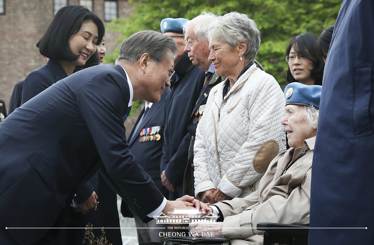 Laying a wreath at the Korean War veterans memorial at Akershus Fortress in Oslo, Norway