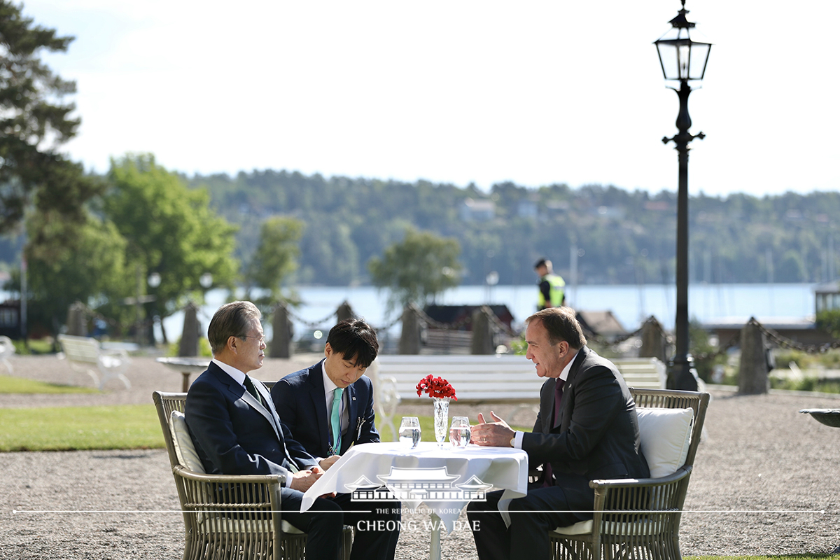 Having a one-on-one conversation with Swedish Prime Minister Stefan Löfven in front of the Grand Hotel Saltsjöbaden in Sweden 