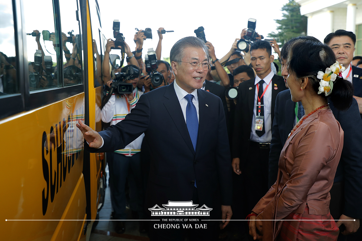 Attending a ceremony to mark the delivery of donated school buses for students in Myanmar 