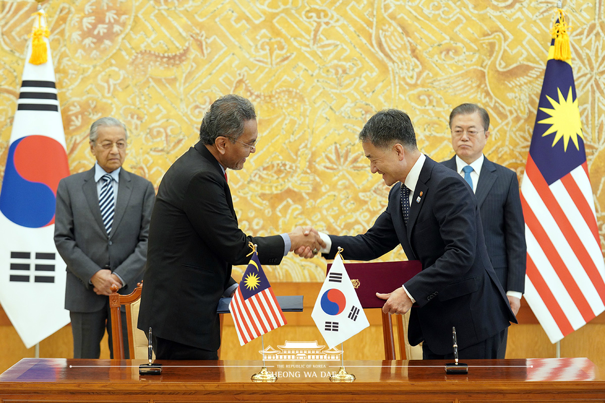 Attending a Korea-Malaysia MOU signing ceremony at Cheong Wa Dae 