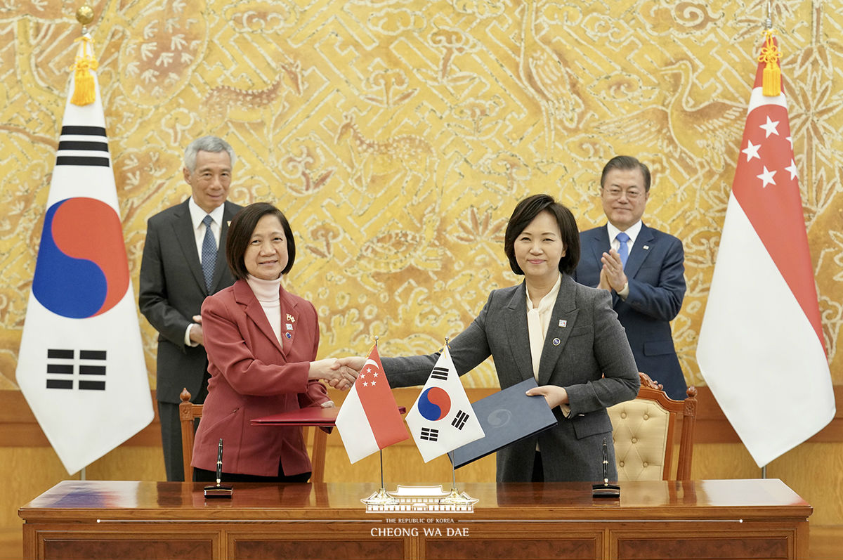 Attending a Korea-Singapore MOU signing ceremony at Cheong Wa Dae 