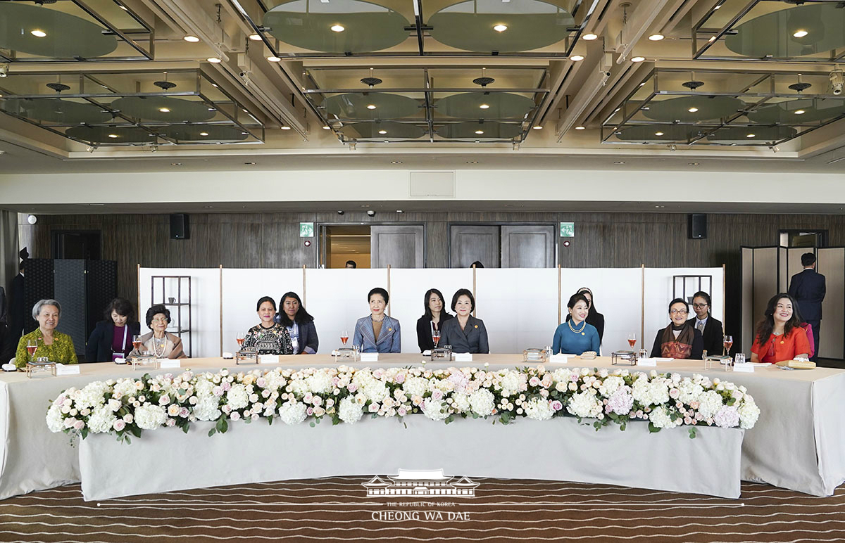 First Lady Kim Jung-sook attending the luncheon for the spouses of ASEAN leaders participating in the ASEAN-ROK Commemorative Summit in Busan 