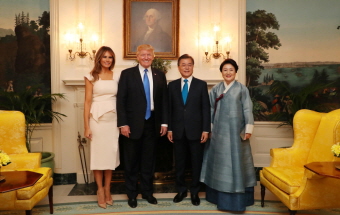 Attending a Dinner Hosted by U.S. President Donald Trump and First Lady Melania Trump