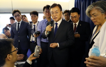 Informal In-flight Meeting with Journalists Traveling with the President 